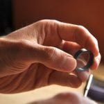 Working on a wooden ring with rotary tool
