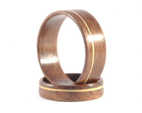 QLD walnut and huon pine matching wedding rings - one ring supporting the other