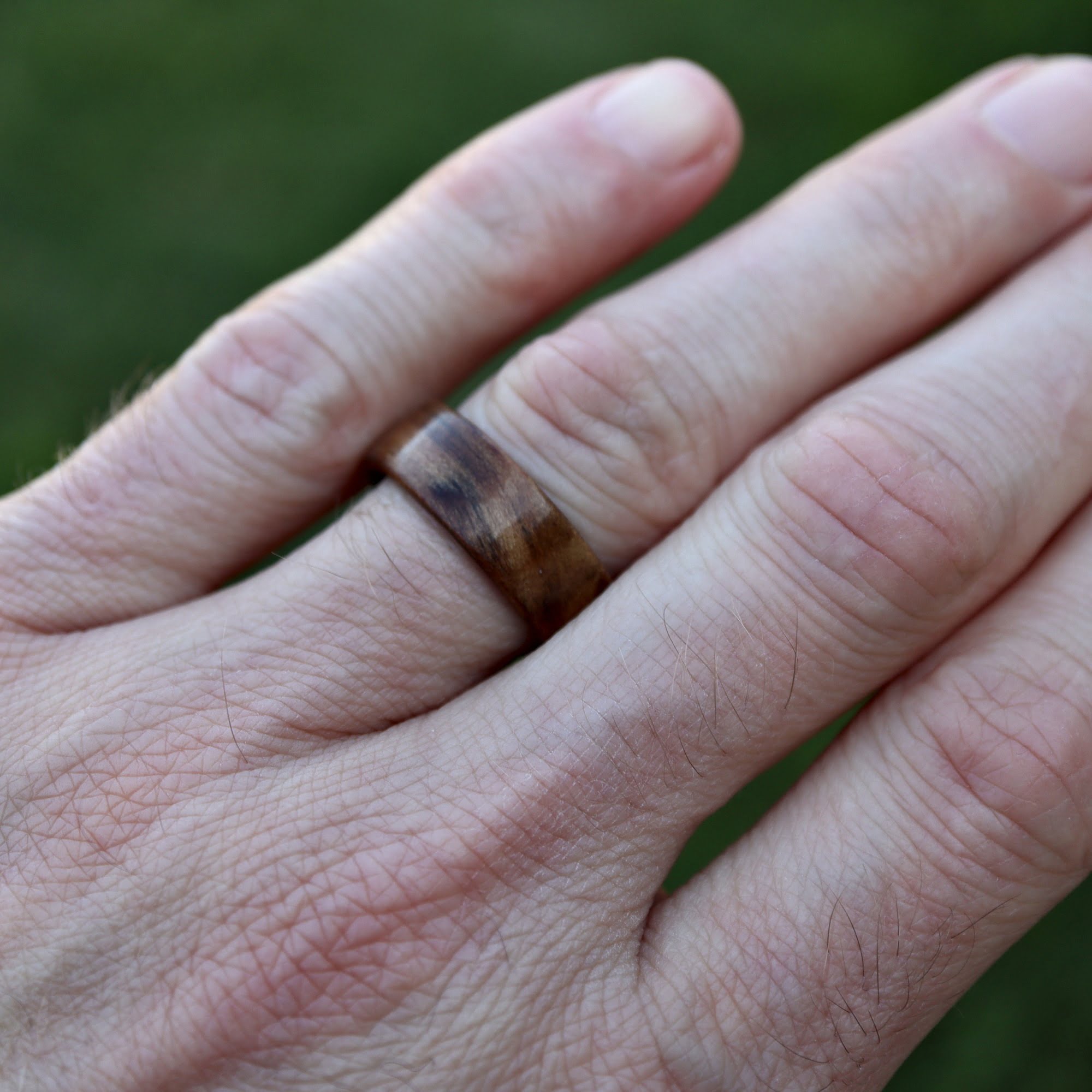 Black Heart Sassafras Wooden Ring on Hand